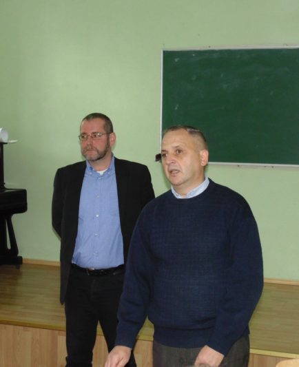 Доцент Василь Зварич представляє гостям лектора професора Міхаеля Мозера